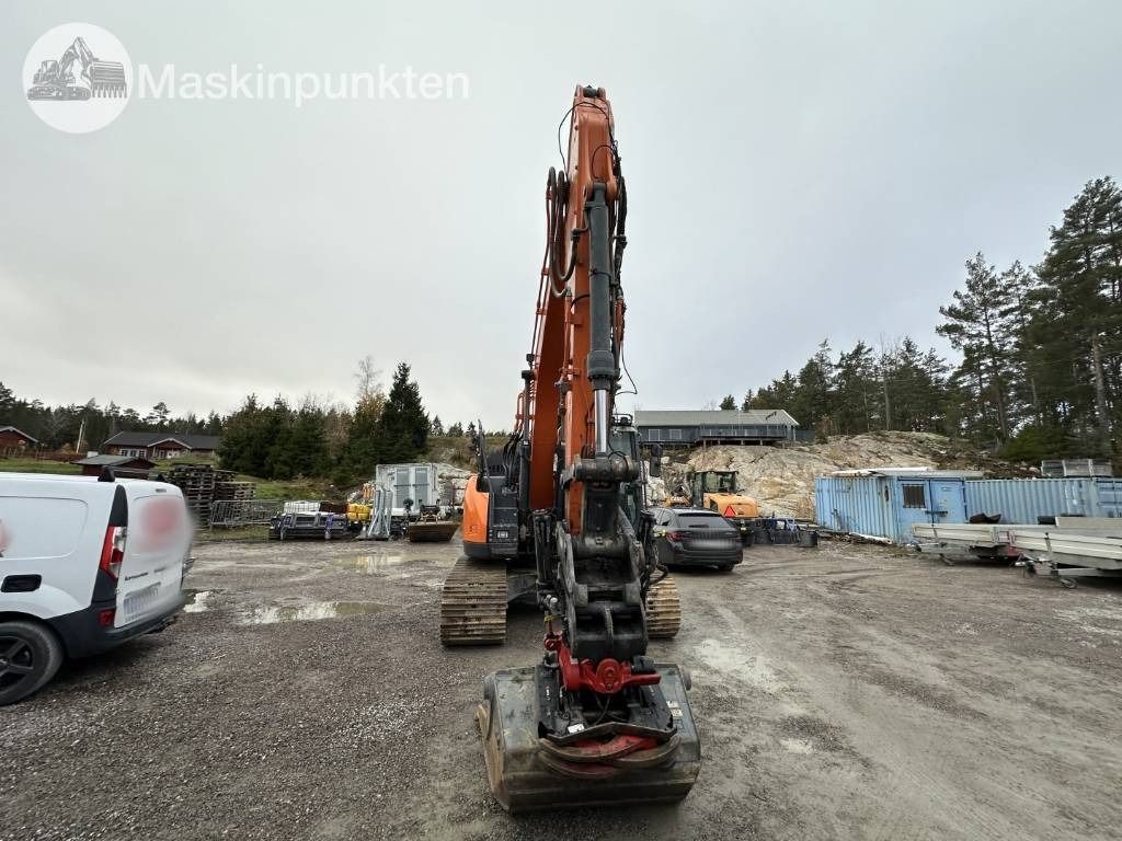 2019 Doosan DX140LCR-5 crawler excavator, front view 2019 Doosan DX140LCR-5 crawler excavator, front view