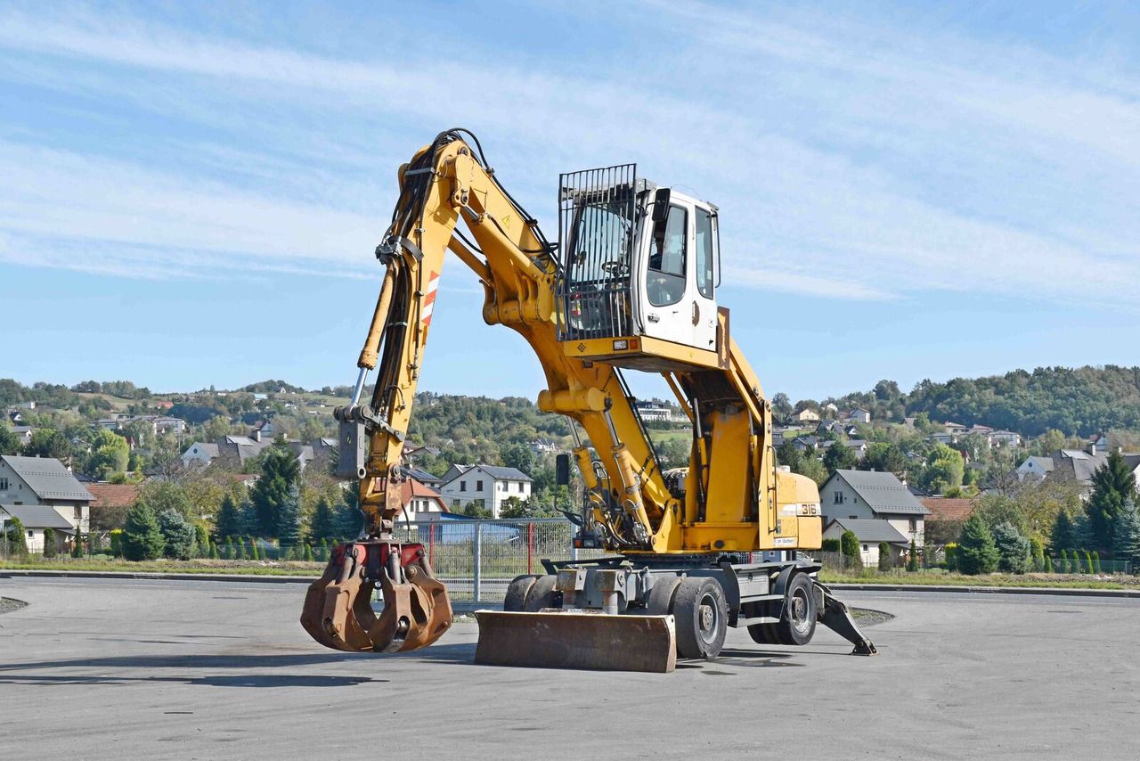 2008 Liebherr A316 material handler, side view 2008 Liebherr A316 material handler, side view