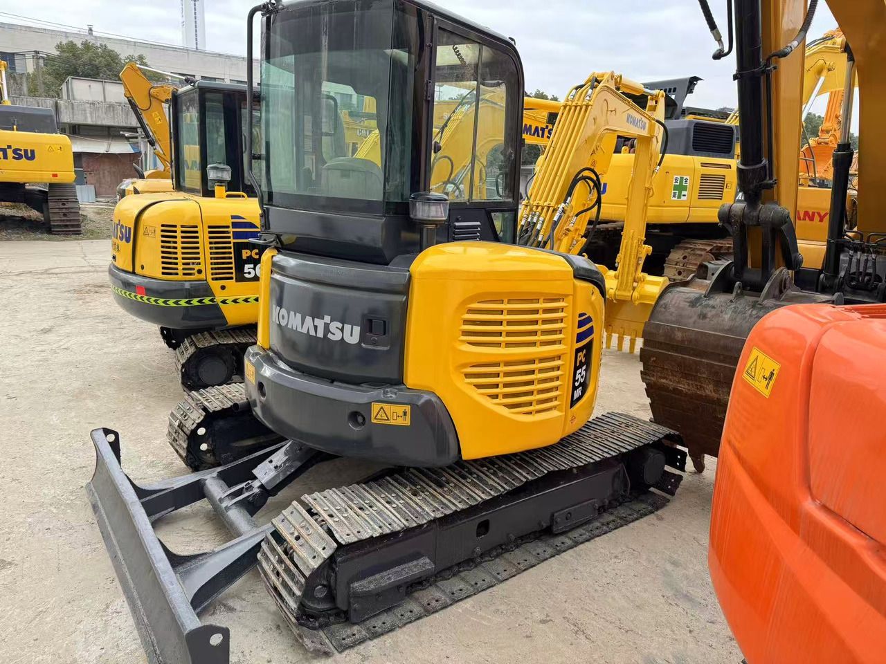 2018 Komatsu PC-55MR mini excavator front three-quarter view 2018 Komatsu PC-55MR mini excavator front three-quarter view
