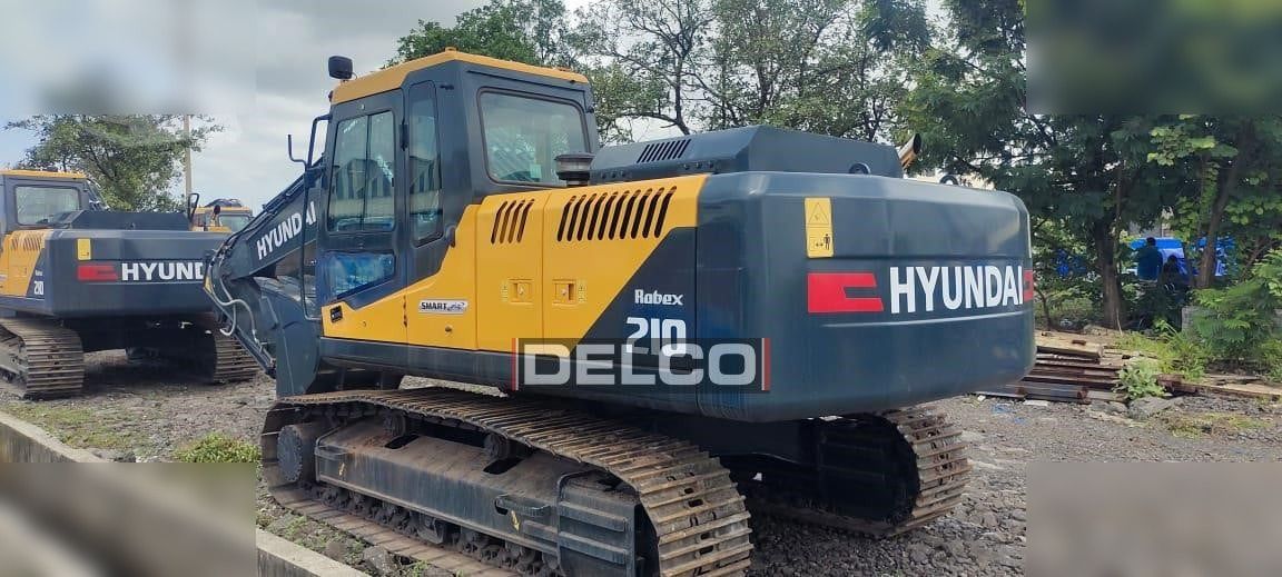 2026 Hyundai Robex 210 crawler excavator, rear three-quarter view 2026 Hyundai Robex 210 crawler excavator, rear three-quarter view