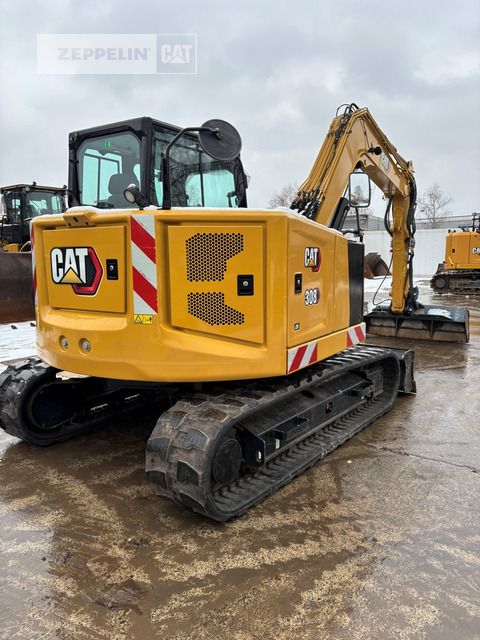 2021 Caterpillar 308 mini excavator, rear three-quarter view 2021 Caterpillar 308 mini excavator, rear three-quarter view