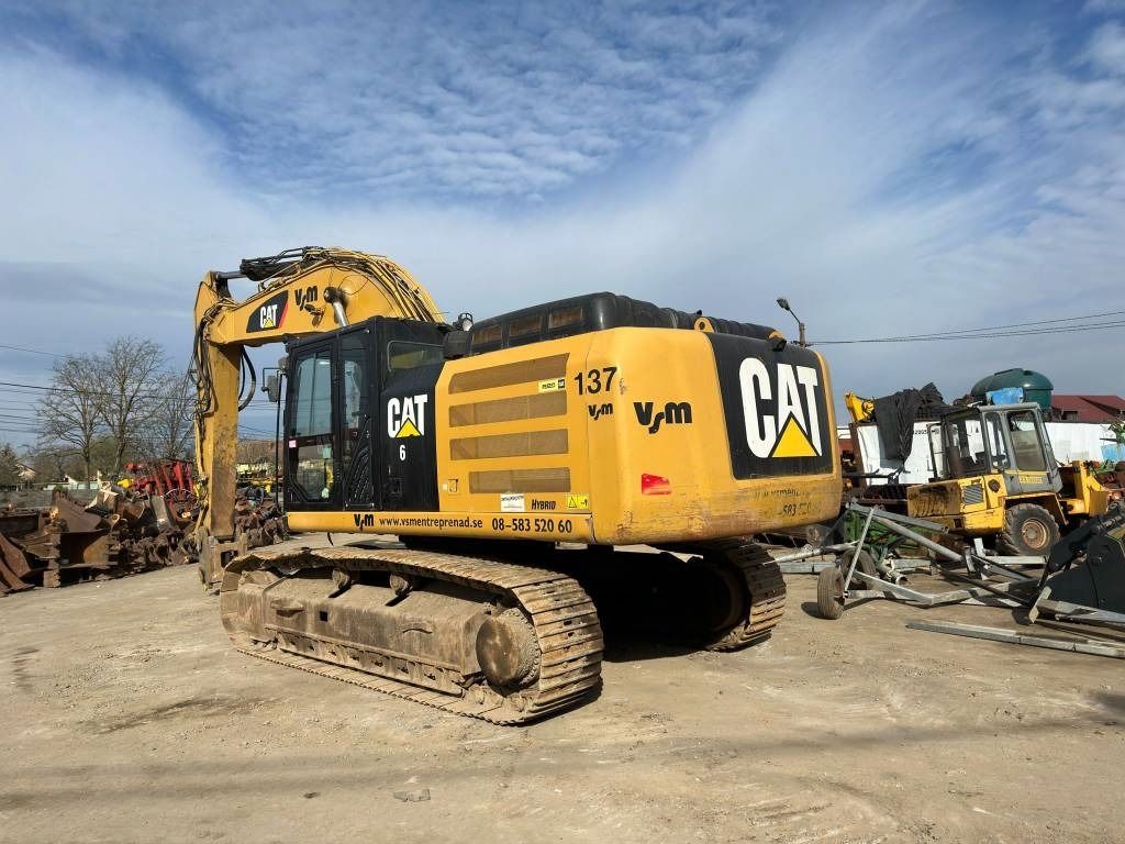 2015 Caterpillar 336EL crawler excavator, rear three-quarter view 2015 Caterpillar 336EL crawler excavator, rear three-quarter view