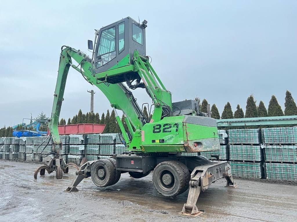 2010 Sennebogen 821 material handler, side view 2010 Sennebogen 821 material handler, side view