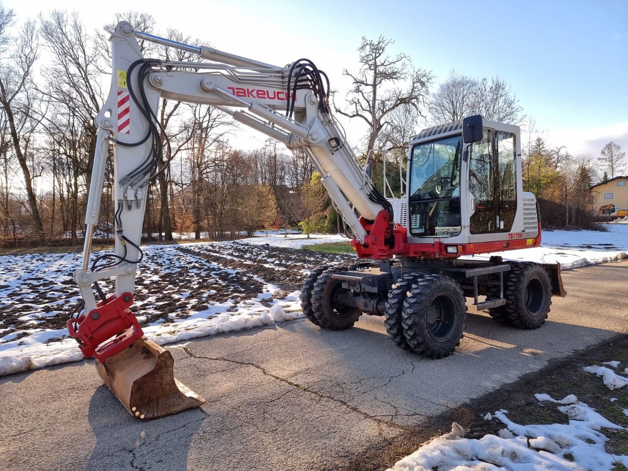 2013 Takeuchi TB175 W wheel excavator side view