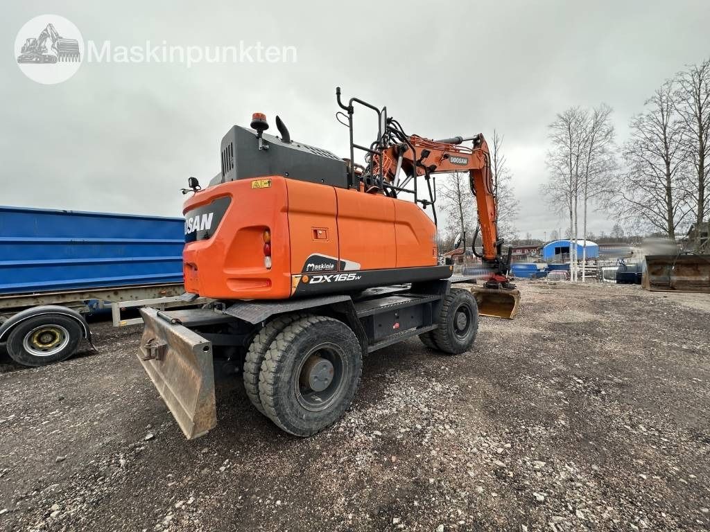 2019 Doosan DX165W-5 wheel excavator rear three-quarter view 2019 Doosan DX165W-5 wheel excavator rear three-quarter view