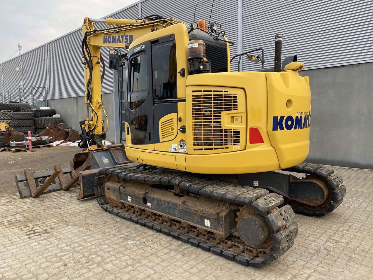 2017 Komatsu PC138US-11 crawler excavator, rear three-quarter view