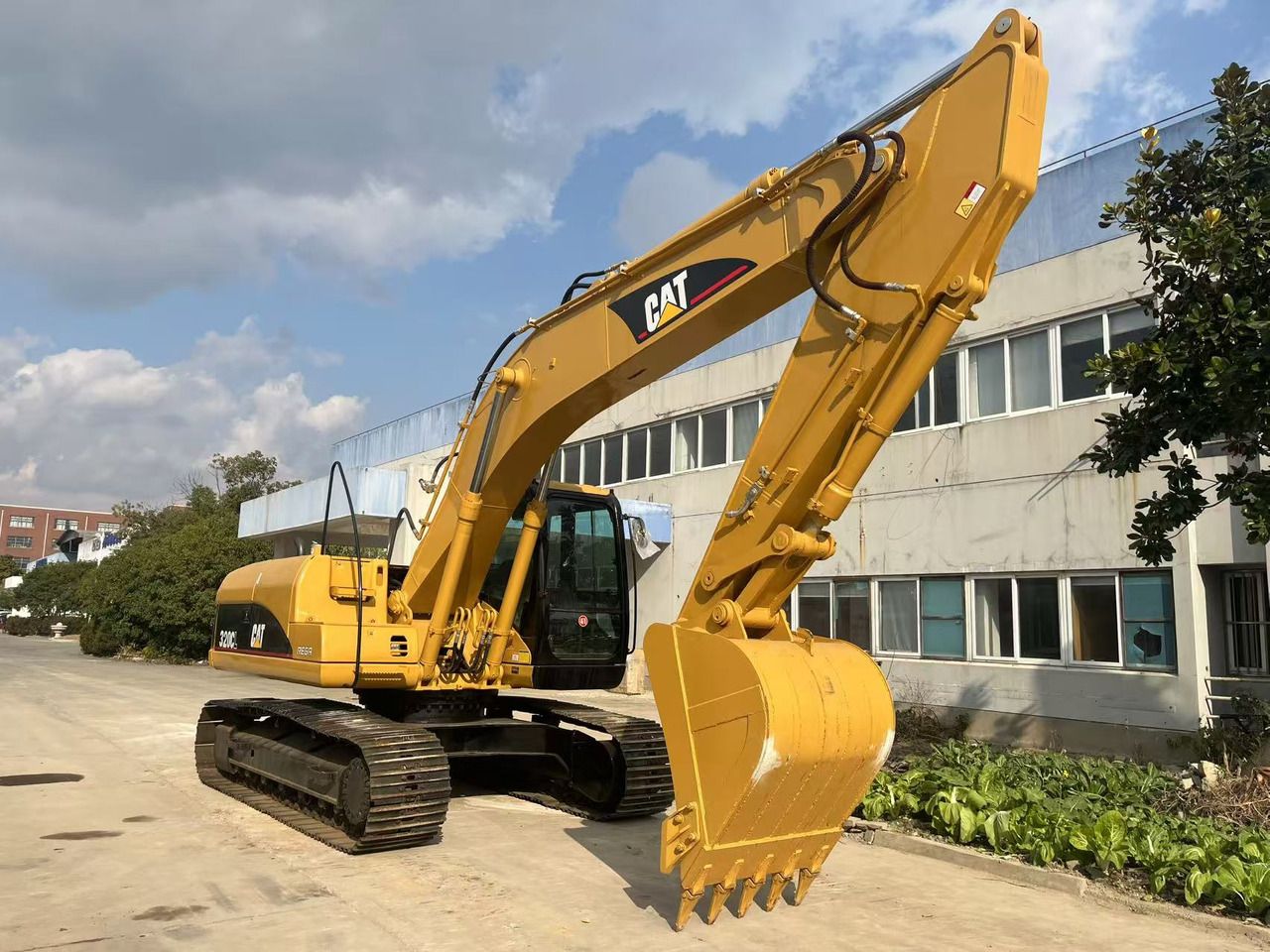 2011 Caterpillar 320CL гусеничний екскаватор, вид збоку 2011 Caterpillar 320CL гусеничний екскаватор, вид збоку