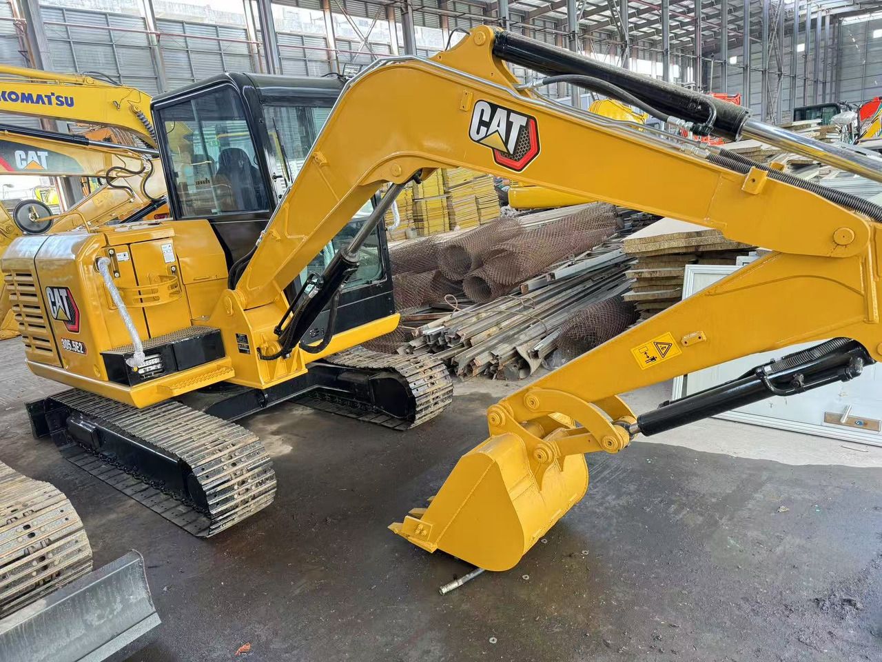 2024 Caterpillar 305.5E2 mini excavator, side view