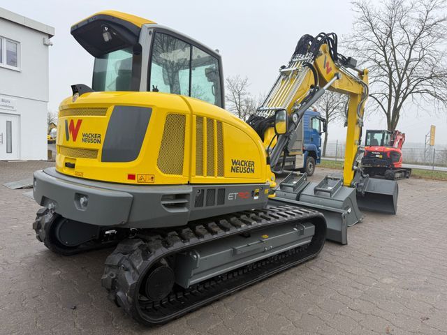 2025 Wacker Neuson ET90 mini excavator, rear three-quarter view 2025 Wacker Neuson ET90 mini excavator, rear three-quarter view