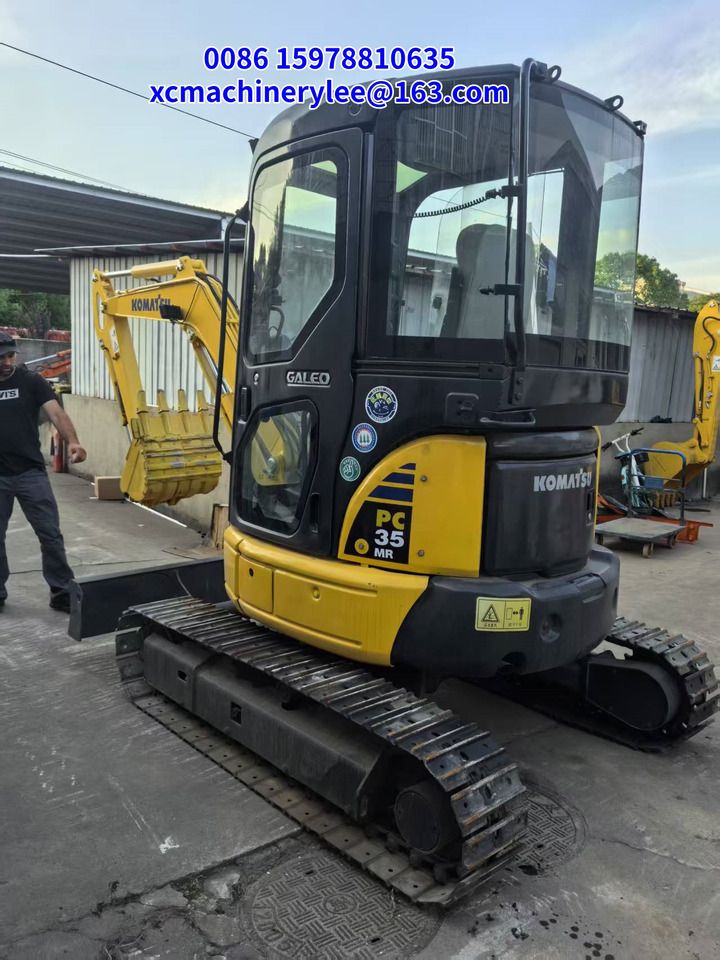 2023 Komatsu PC35 MR mini excavator, rear three-quarter view 2023 Komatsu PC35 MR mini excavator, rear three-quarter view