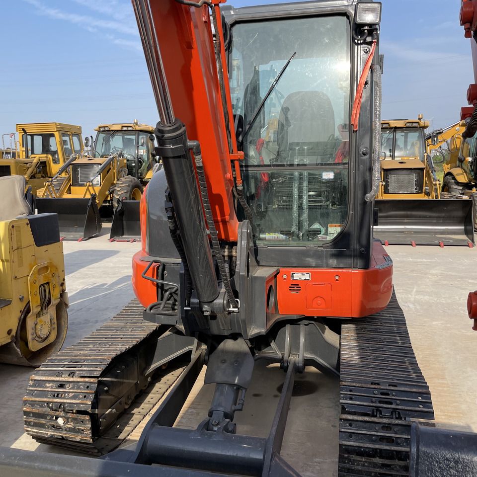 Kubota KX165-5 mini excavator, front view of cab and boom
