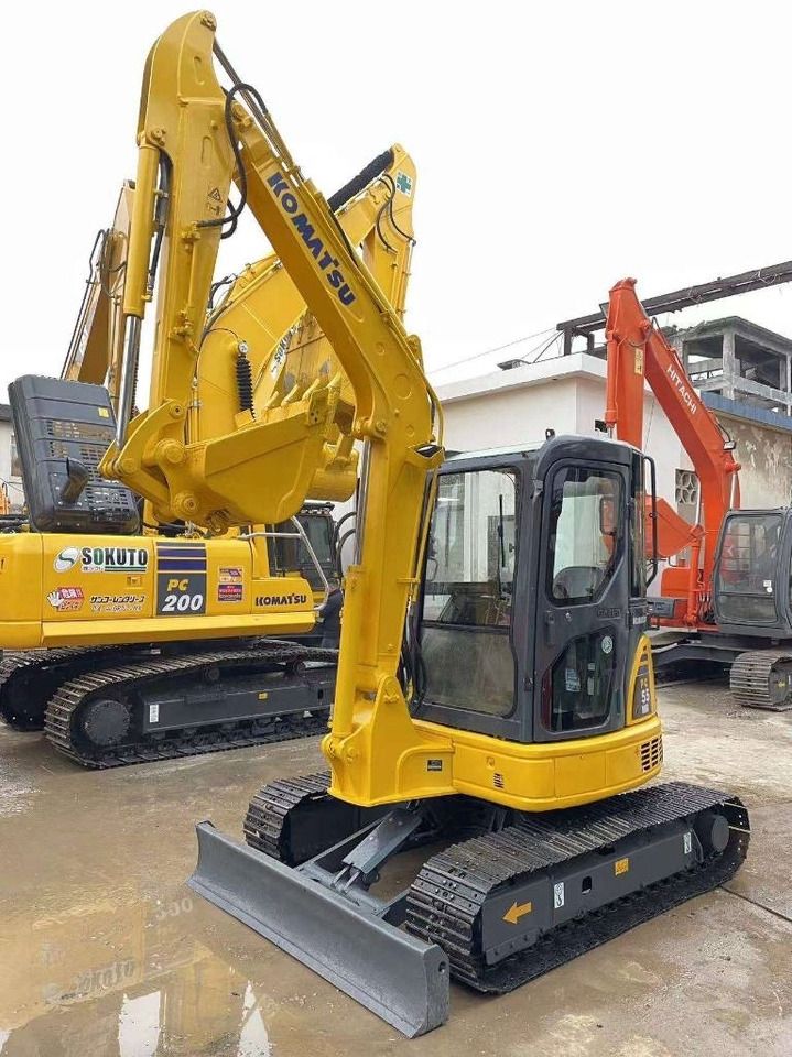 2020 Komatsu PC-55MR mini excavator, front three-quarter view 2020 Komatsu PC-55MR mini excavator, front three-quarter view