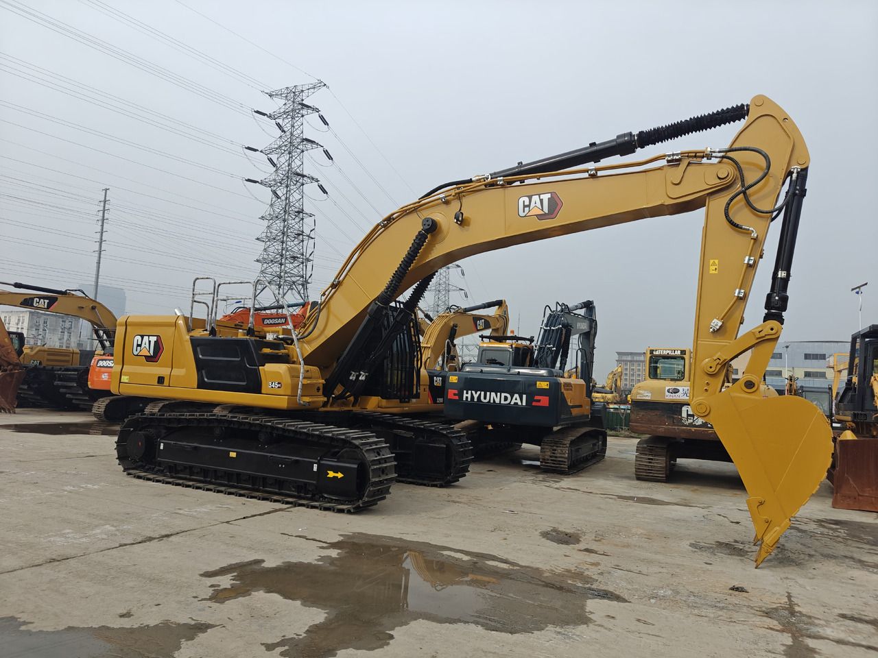 2024 Caterpillar 345GC crawler excavator, side profile view