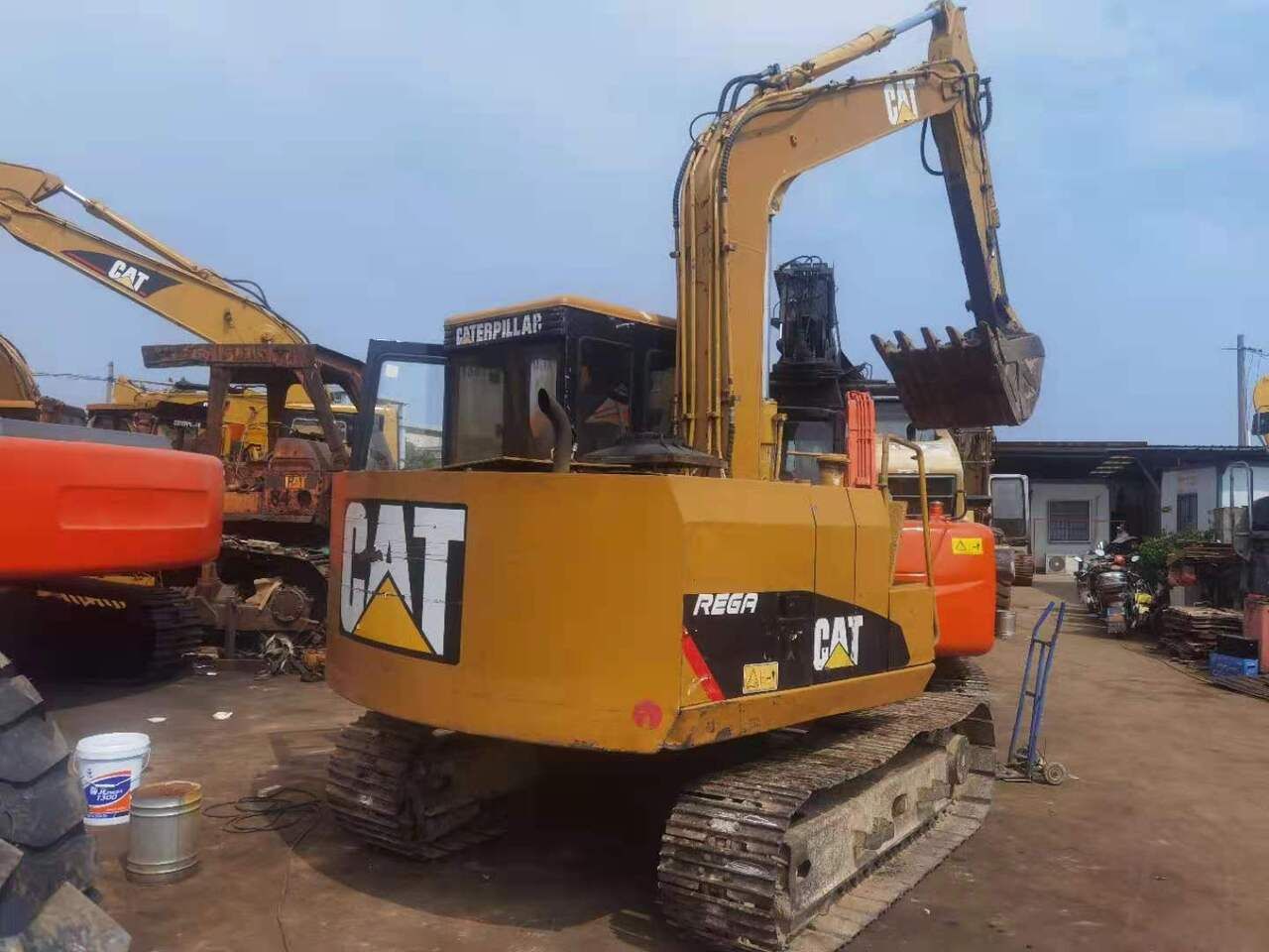 2011 Caterpillar E70B crawler excavator, rear three-quarter view