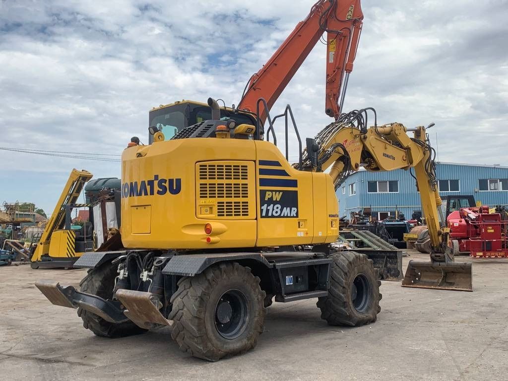 2018 Komatsu PW118MR-11W wheel excavator, rear three-quarter view