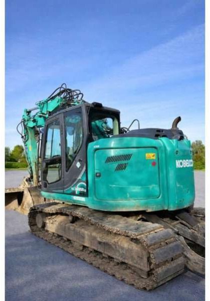2016 Kobelco SK140SRLC-5 crawler excavator, rear three-quarter view 2016 Kobelco SK140SRLC-5 crawler excavator, rear three-quarter view