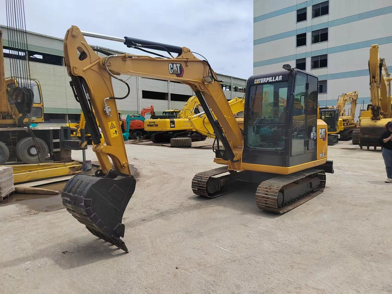 2021 Caterpillar 305.5E2 mini excavator, side view 2021 Caterpillar 305.5E2 mini excavator, side view
