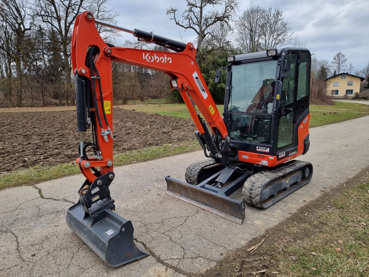 2023 Kubota KX030-4 crawler excavator, front three-quarter view