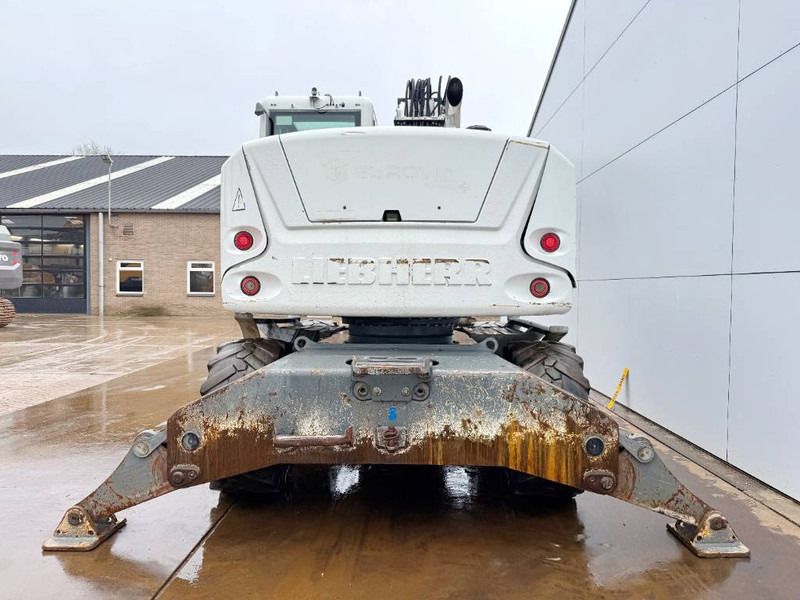 2012 Liebherr A914 COMPACT wheel excavator rear view 2012 Liebherr A914 COMPACT wheel excavator rear view