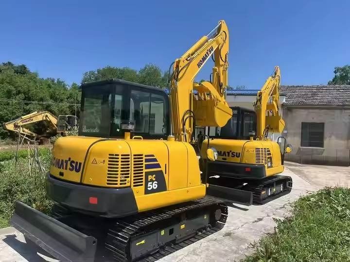 2024 Komatsu PC56-7 mini excavator, rear three-quarter view 2024 Komatsu PC56-7 mini excavator, rear three-quarter view