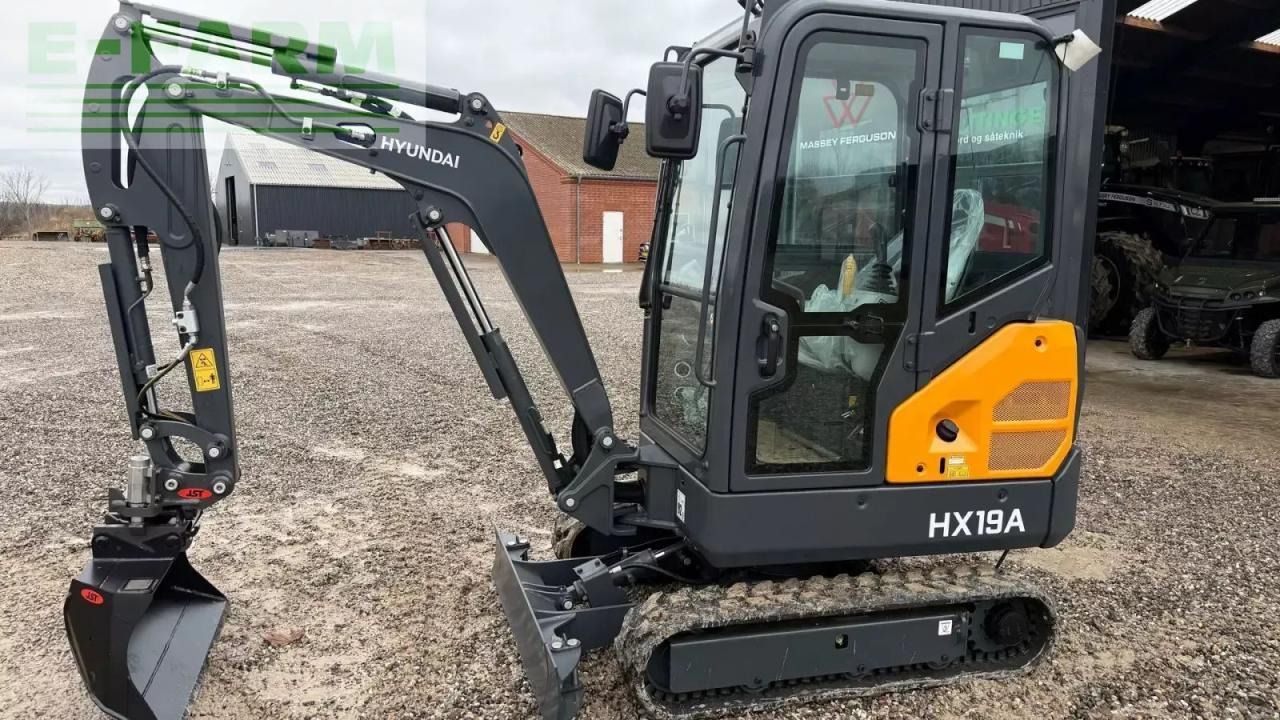 2026 Hyundai HX19A mini excavator, side view 2026 Hyundai HX19A mini excavator, side view