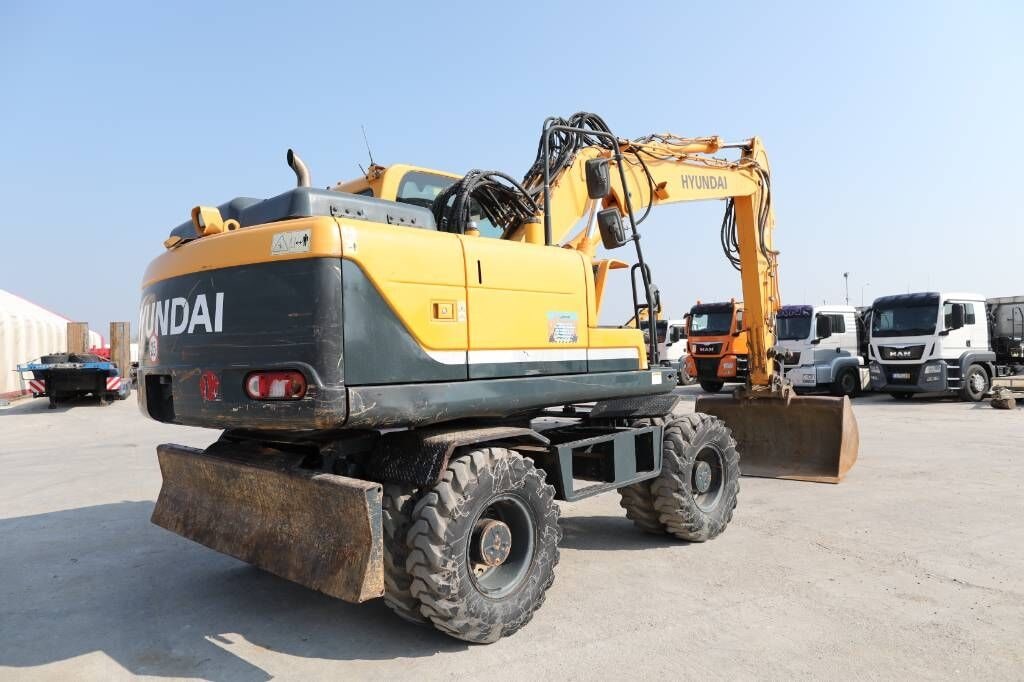 2015 Hyundai R140W-9A wheel excavator, rear three-quarter view 2015 Hyundai R140W-9A wheel excavator, rear three-quarter view