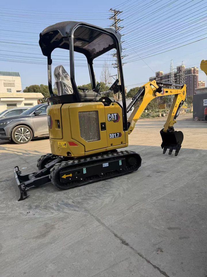 2022 Caterpillar 301.7 mini excavator, rear three-quarter view 2022 Caterpillar 301.7 mini excavator, rear three-quarter view