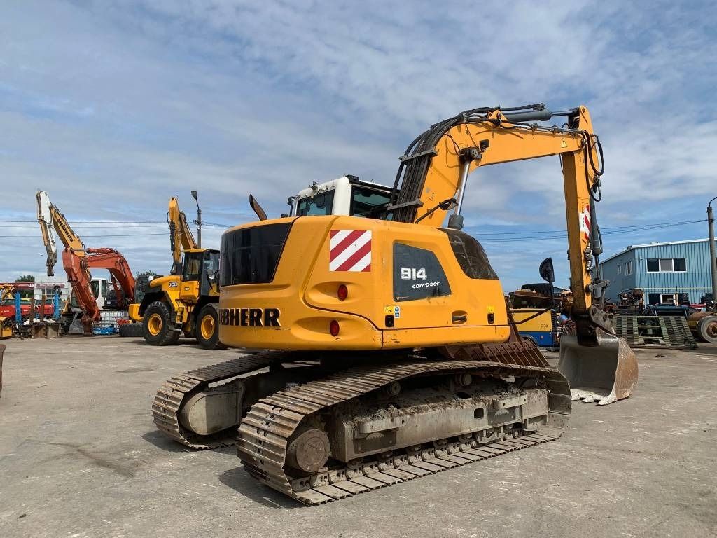 2015 Liebherr R914 Compact Litronic crawler excavator, rear three-quarter view 2015 Liebherr R914 Compact Litronic crawler excavator, rear three-quarter view