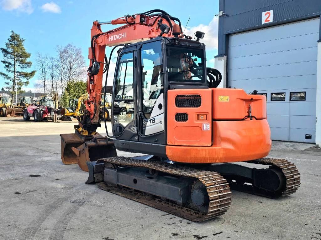 2014 Hitachi ZX85US-5A mini excavator, rear three-quarter view 2014 Hitachi ZX85US-5A mini excavator, rear three-quarter view