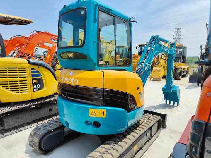 2023 Kubota U25 mini excavator, rear three-quarter view