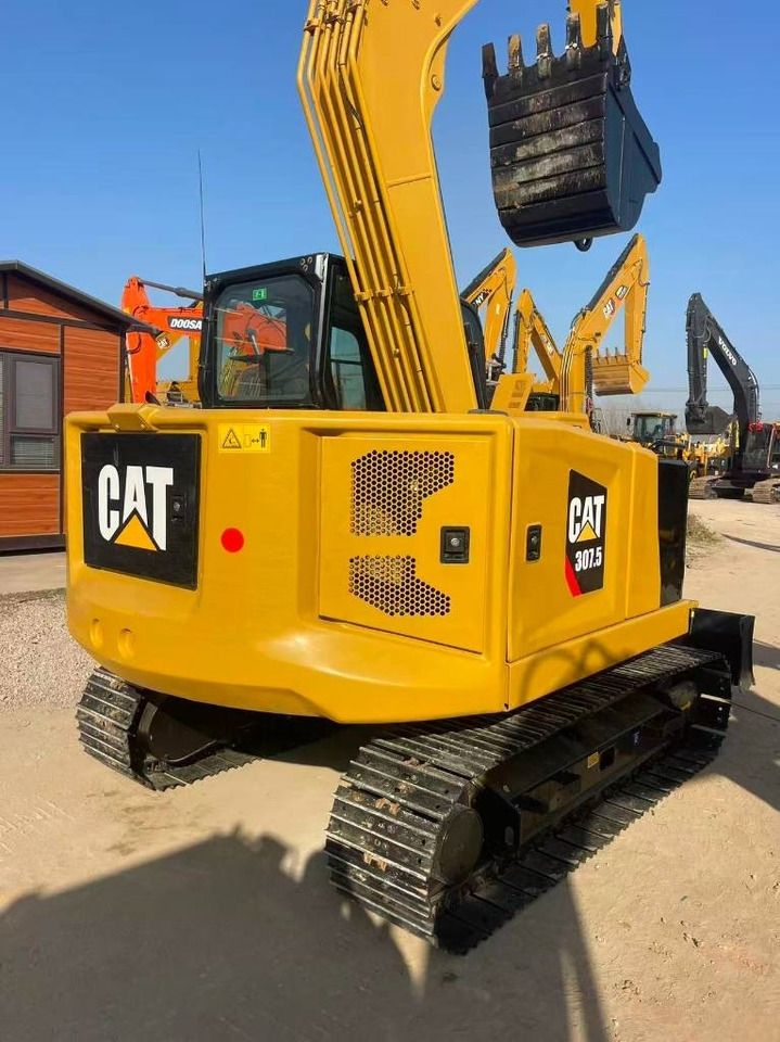 2025 Caterpillar 307.5 mini excavator rear three-quarter view