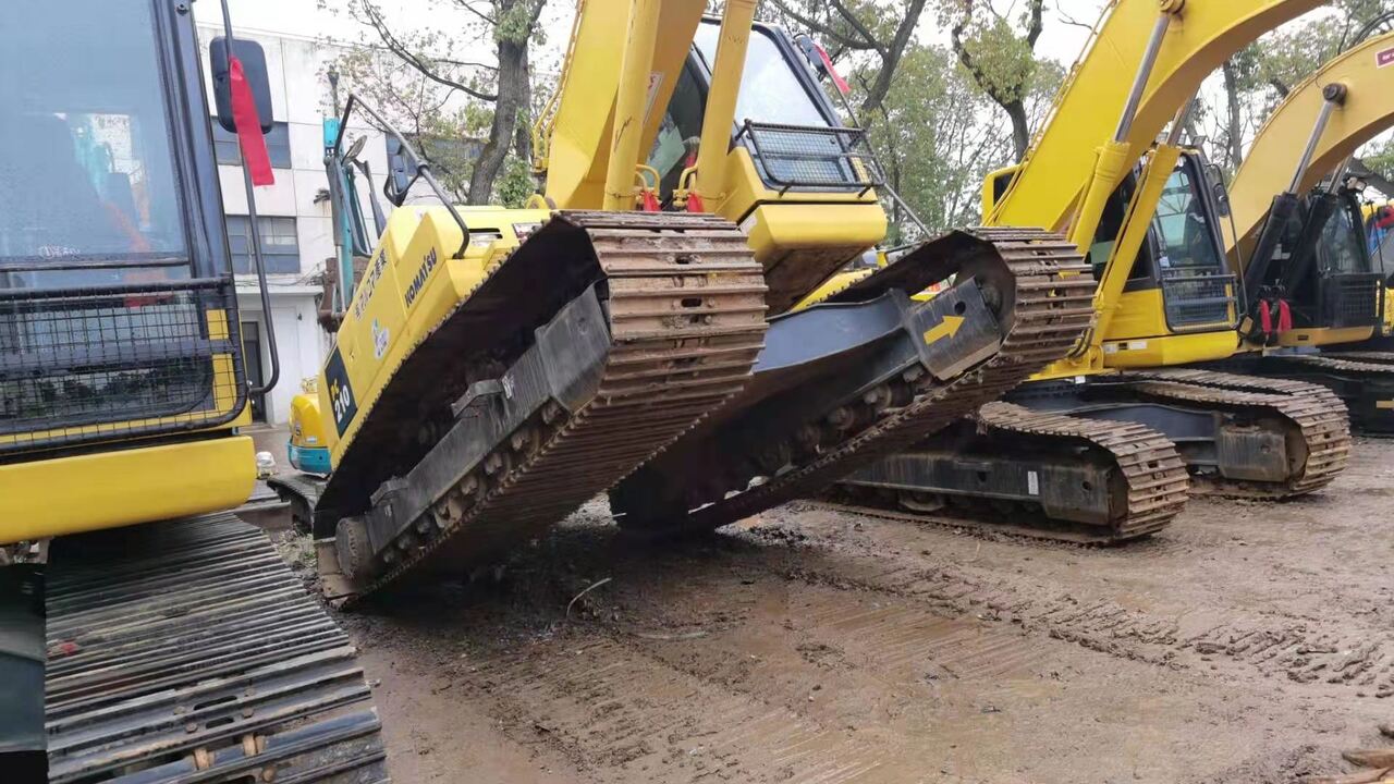 2011 Komatsu PC210-8 crawler excavator, rear three-quarter view 2011 Komatsu PC210-8 crawler excavator, rear three-quarter view