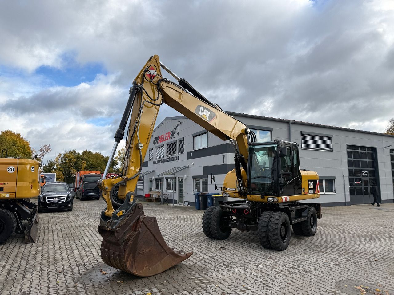 2010 Caterpillar M316D wheel excavator, side profile view