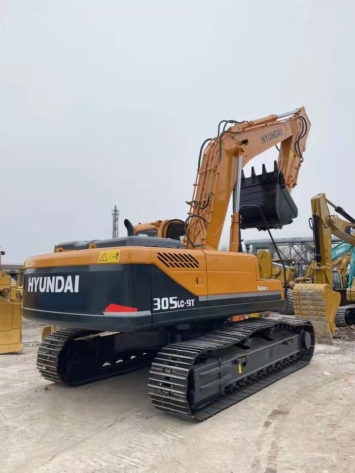 2017 Hyundai R305LC-9T crawler excavator, rear three-quarter view 2017 Hyundai R305LC-9T crawler excavator, rear three-quarter view