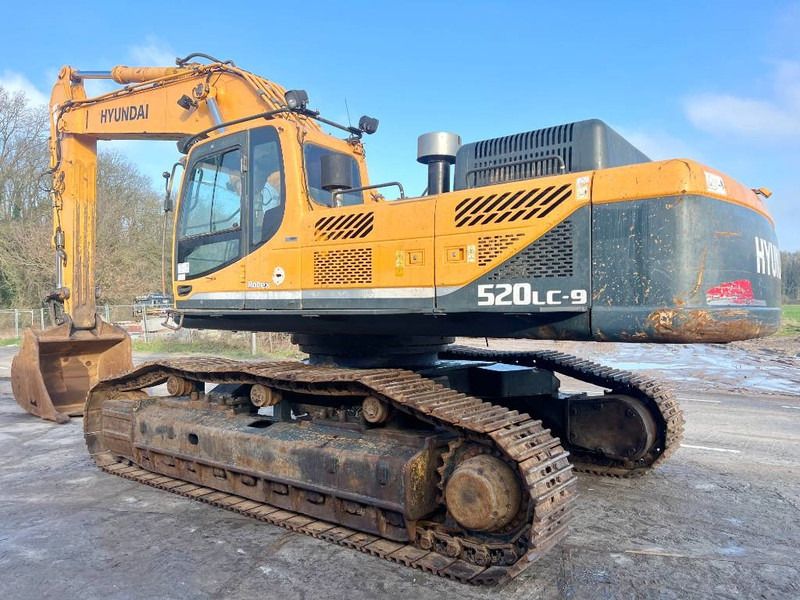 2012 Hyundai 520LC-9 crawler excavator, rear three-quarter view 2012 Hyundai 520LC-9 crawler excavator, rear three-quarter view