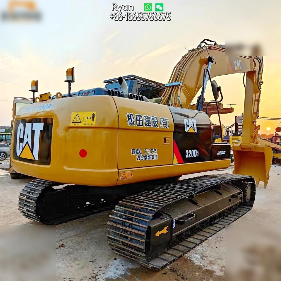 2018 Caterpillar 320D2 crawler excavator, rear three-quarter view 2018 Caterpillar 320D2 crawler excavator, rear three-quarter view