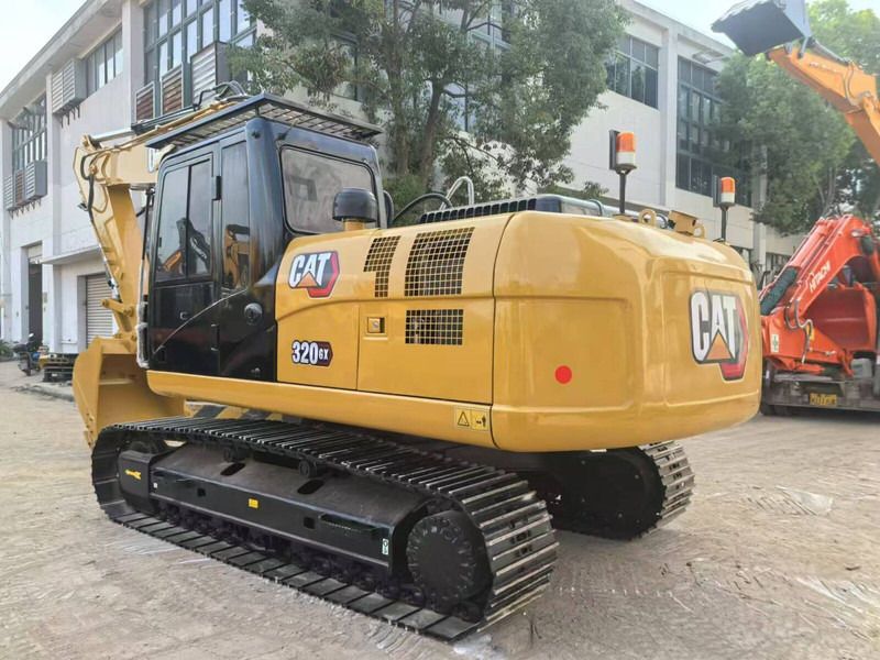 2024 Caterpillar 320GX crawler excavator, rear three-quarter view