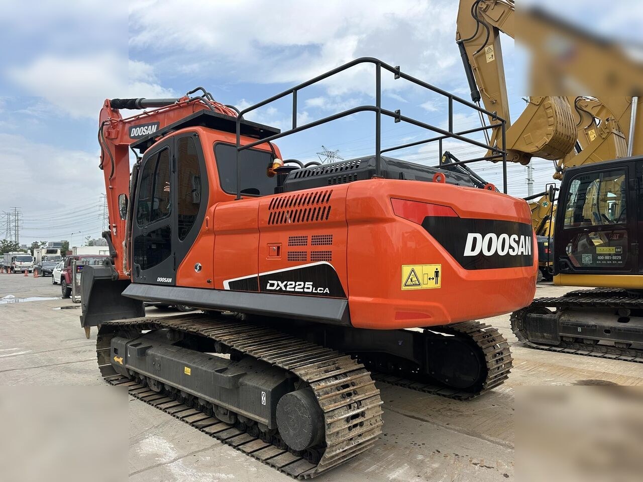 2024 Doosan DX225LCA crawler excavator, rear three-quarter view