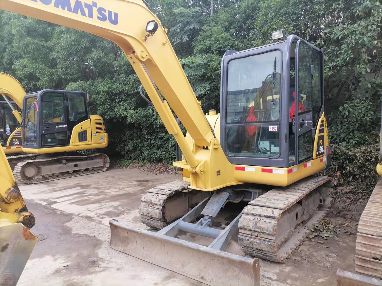2016 Komatsu PC56-7 mini excavator, front three-quarter view 2016 Komatsu PC56-7 mini excavator, front three-quarter view