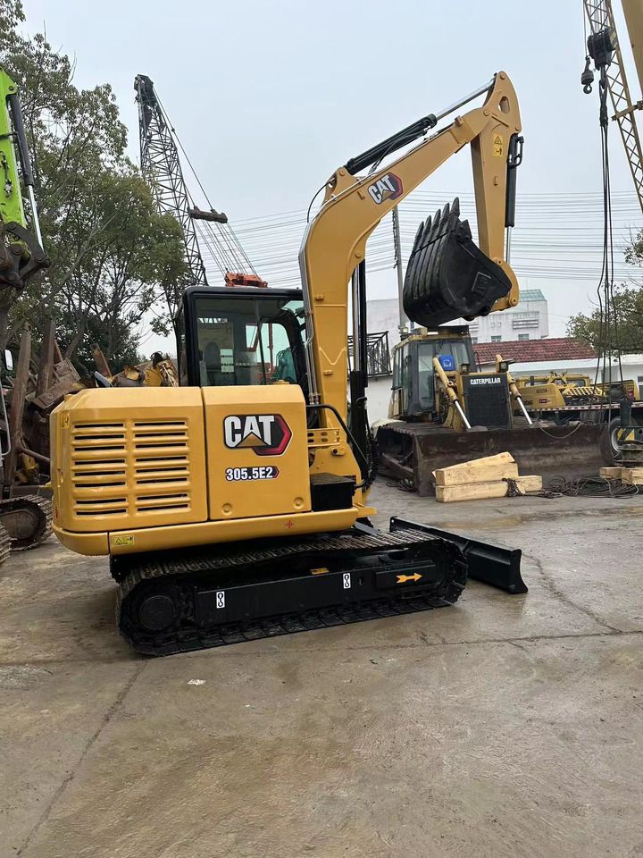 2021 Caterpillar 305.5E2 mini excavator, rear three-quarter view