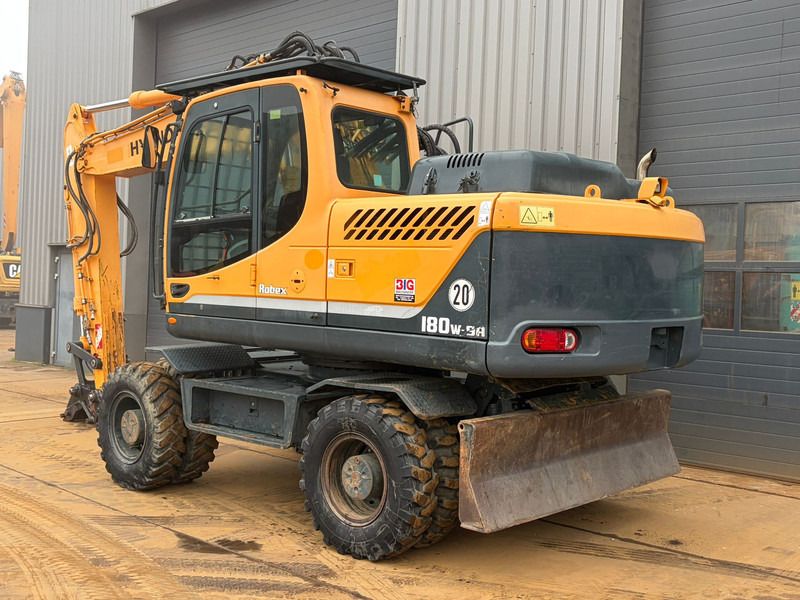 2014 Hyundai R180W-9A wheel excavator, rear three-quarter view
