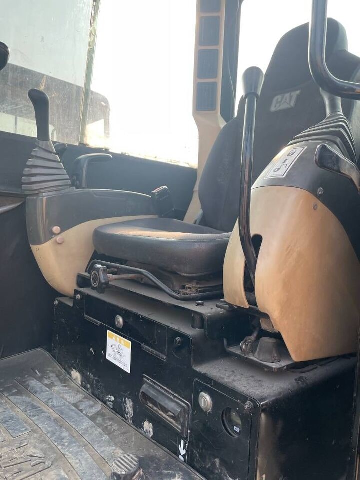 2025 Caterpillar 306 mini excavator cab interior view