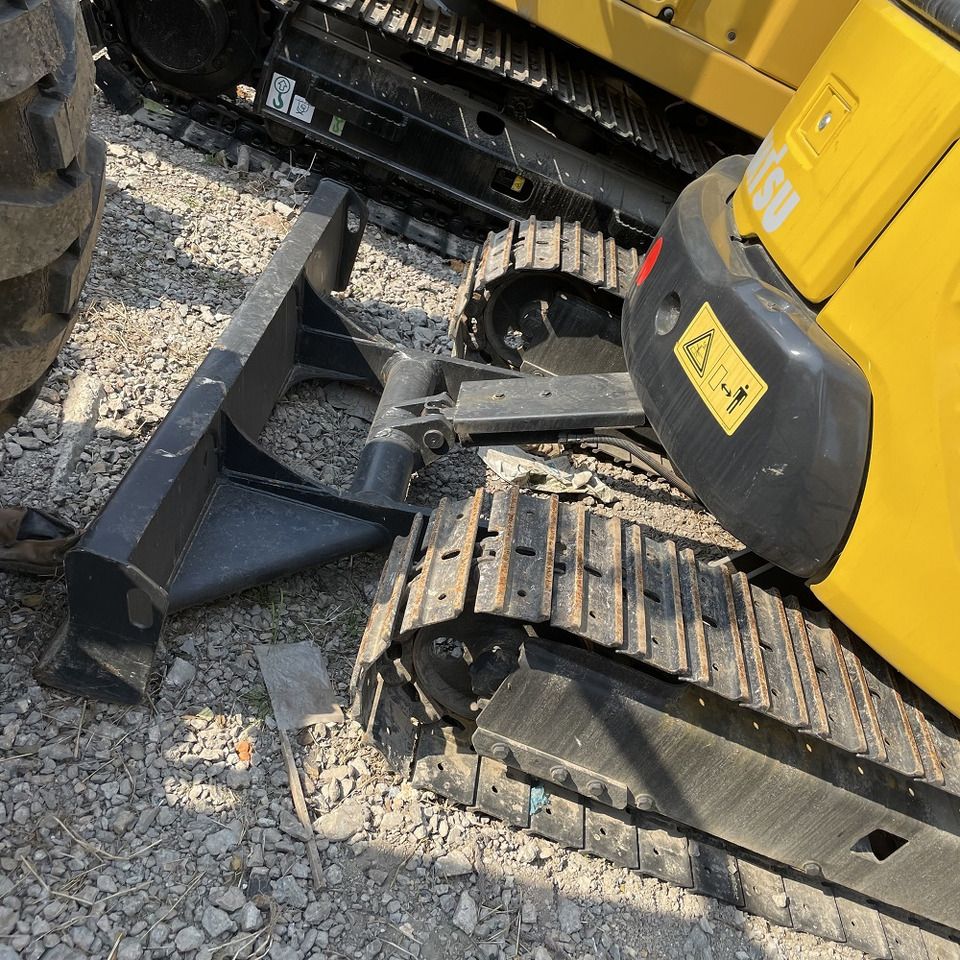 Komatsu PC30MR mini excavator rear view with blade