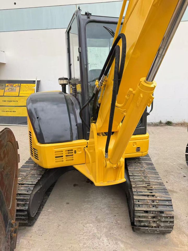 2018 Komatsu PC-55MR mini excavator, rear three-quarter view 2018 Komatsu PC-55MR mini excavator, rear three-quarter view