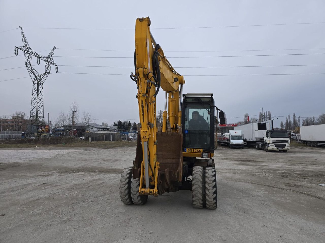 2007 JCB JS145W wheel excavator, front view 2007 JCB JS145W wheel excavator, front view