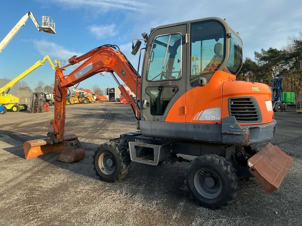 2015 Doosan DX55W mini excavator, side view