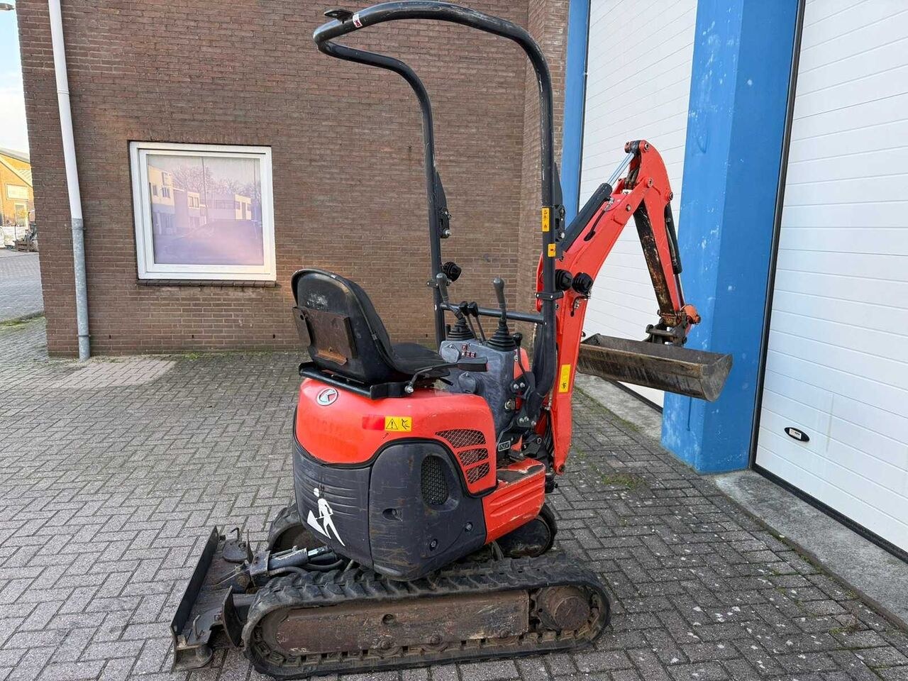 2014 Kubota U10-3 mini excavator, rear three-quarter view