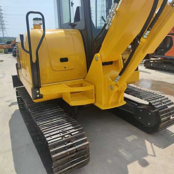 2022 Komatsu PC56 crawler excavator, rear three-quarter view 2022 Komatsu PC56 crawler excavator, rear three-quarter view