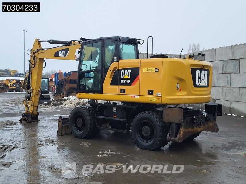 2016 Caterpillar M316F wheel excavator, rear three-quarter view