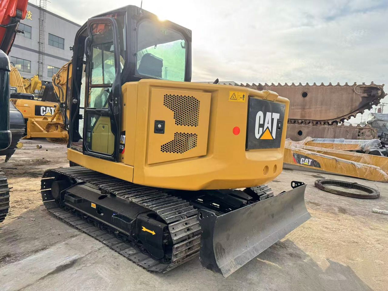 2024 Caterpillar 307.5 mini excavator, rear three-quarter view 2024 Caterpillar 307.5 mini excavator, rear three-quarter view